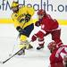 Michigan junior right wingman Luke Moffatt passes in the second period on Saturday. Daniel Brenner I AnnArbor.com